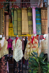 Fabrics stall Pha Soet Hot Spring Chiang Rai Thailand with clothes and material