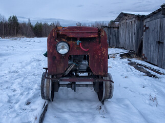 Obraz premium a small railcar stands on the railroad tracks. Railcar for maintenance of the railway and security checks.