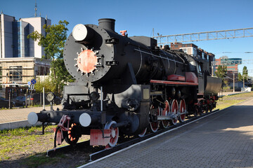 Vintage locomotive close-up. Train, transport, rails