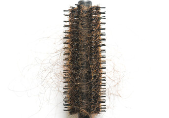 Dirty Round Hair Brush on white background close up photo