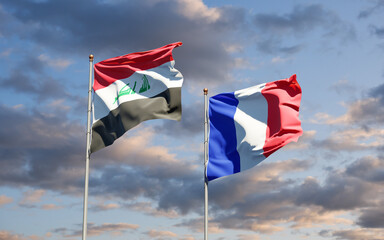 Beautiful national state flags of Iraq and France together at the sky background. 3D artwork concept.