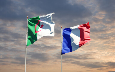 Beautiful national state flags of France and Algeria together at the sky background. 3D artwork concept.