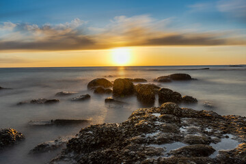 Naklejka premium sunset on the beach