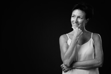 Portrait of happy mature beautiful woman with short hair