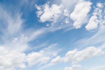 Fototapeta na wymiar Cirrocumulus clouds in the light blue sky background