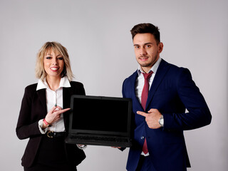 Business staff show business results on computer