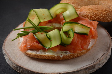 Bagel sandwich with salmon, cream cheese, cucumber, 