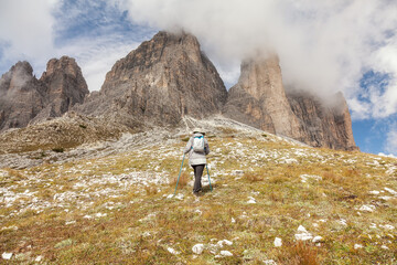 Hiking on a fine autumn day attracts tourists to Dolomites, Italy