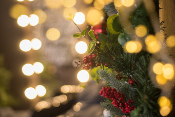 Fototapeta na wymiar Christmas tree with gold blurred light background