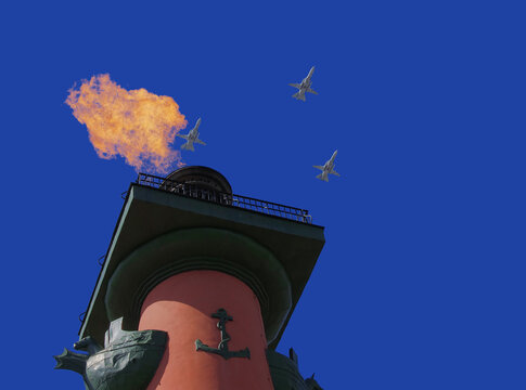 Russian military aircraft in the blue sky with rastral columns of St. Petersburg