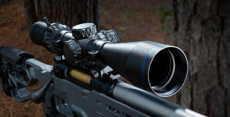 rifle scope on a high-powered rifle in a dark forest