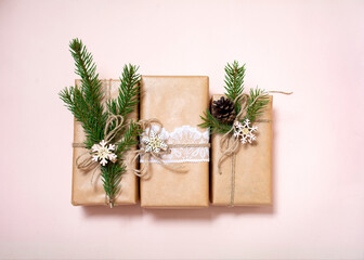 Christmas gifts are decorated with natural materials and wooden star trinkets. Zero Waste Christmas