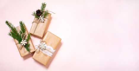 Christmas gifts are decorated with natural materials and wooden star trinkets. Zero Waste Christmas