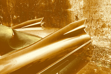 Gold color car in the street