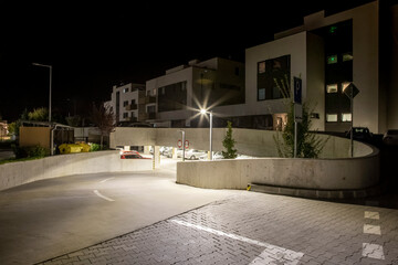 Fototapeta na wymiar entrance to the underground garages with modern Led street illumination
