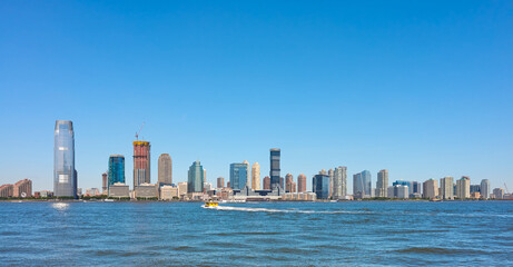 Fototapeta na wymiar Jersey City skyline on a sunny summer day, USA.