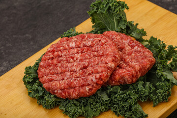 Raw beef burger cutlet for cooking