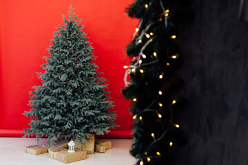 Christmas tree with gifts New Year scenery room red