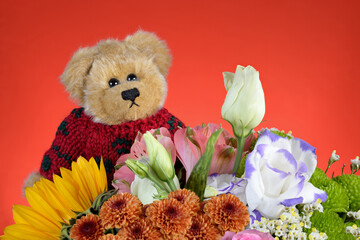 Teddy bear with flower bouquet