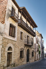 Fototapeta na wymiar Traditional architecture houses in San Pedro street, Cuenca city