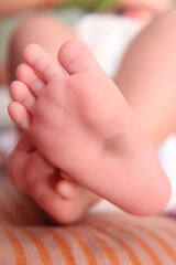 Obraz na płótnie Canvas Closeup new born infant baby feet.