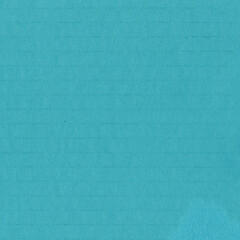 A blue vintage rough sheet of carton. Recycled environmentally friendly cardboard paper texture. Simple minimalist papercraft background.