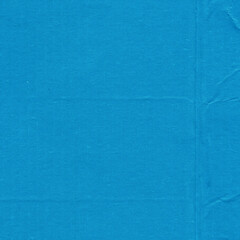 A blue vintage rough sheet of carton. Recycled environmentally friendly cardboard paper texture. Simple minimalist papercraft background.