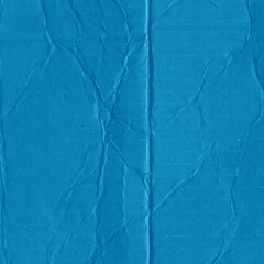 A blue vintage rough sheet of carton. Recycled environmentally friendly cardboard paper texture. Simple minimalist papercraft background.