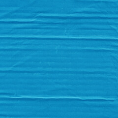 A blue vintage rough sheet of carton. Recycled environmentally friendly cardboard paper texture. Simple minimalist papercraft background.