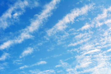  white cumulus clouds on blue sky natural background 