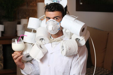 Comedian wearing fashionable toilet paper outfit 
