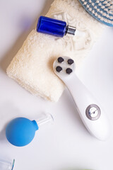 Naklejka premium set for massage with hardware equipment, vacuum jars and and massage brush. anti-age and anti-cellulite set for home procedure. beauty consept