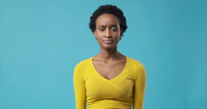 Disappointed african american woman regretting her deeds