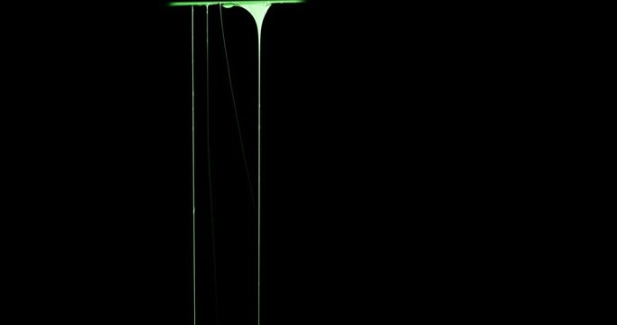 Green Slime Dripping In Black Background 