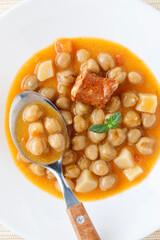 Stew with chikpeas and sausage, typical spanish