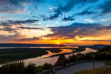 Fototapeta premium Landscape with sunset on the river in summer