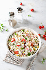 Salad with crab sticks, cabbage and tomatoes