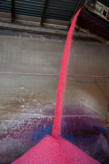 Production of pink, magenta colored  fertilizers and pesticides in an old fabric