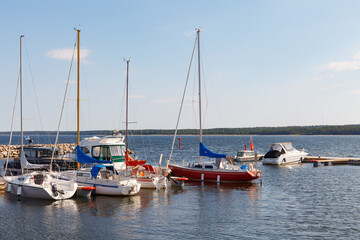 Fototapeta na wymiar NEEME, ESTONIA - SEPTEMBER, 30, 2019: Boats of private marina in Neeme