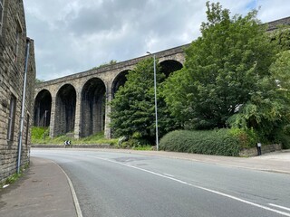 Huge Victorian stone built railway viaduct, next to the A646 Burnley Road in, Lydgate, Todmorden, UK