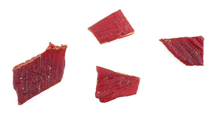 Portion of beef jerky isolated on a white background. Beef jerky pieces.