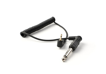 Flash accessory, sync cable isolated on white background. Concept of accessories for equipment.