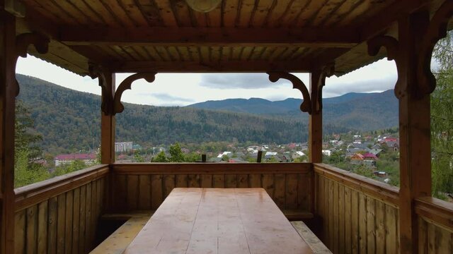 4K Drone aerial view starting from alcone in the mountain hutsul village Yaremche, Carpathian mountains Ukraine beautiful nature