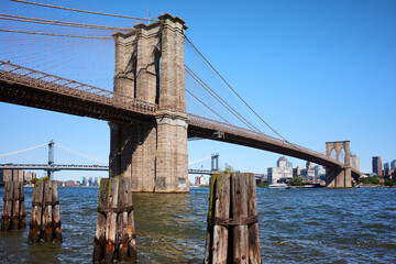 Brooklyn Bridge and East River on a sunny day, New York City, USA.