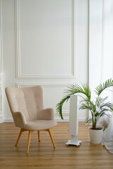 Air purifier in room for filter and cleaning removing dust in home,for fresh air and healthy life. Protects people from dangerous viruses.