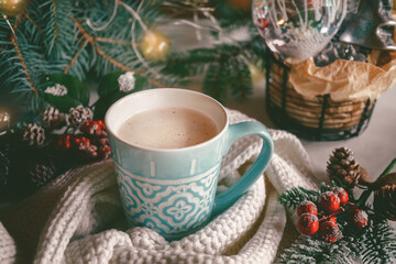 Hot chocolate or cocoa on the Christmas table. Hot winter drinks in a cozy still life.