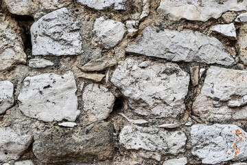 Fondo de pared de piedras grises.