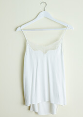 White Silk and Romantic Nightwear on Hanger Monochrome Color Minimal Design
