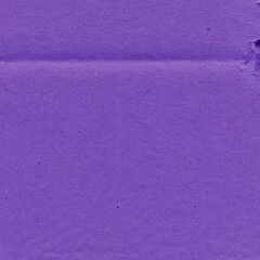 A violet vintage rough sheet of carton. Recycled environmentally friendly cardboard paper texture. Simple minimalist papercraft background.