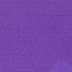 Fototapeta premium A violet vintage rough sheet of carton. Recycled environmentally friendly cardboard paper texture. Simple minimalist papercraft background.